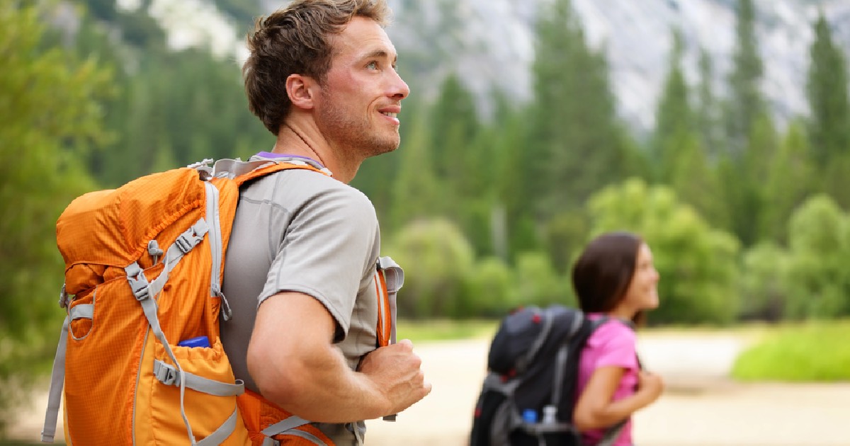 Man going backpacking with friend 