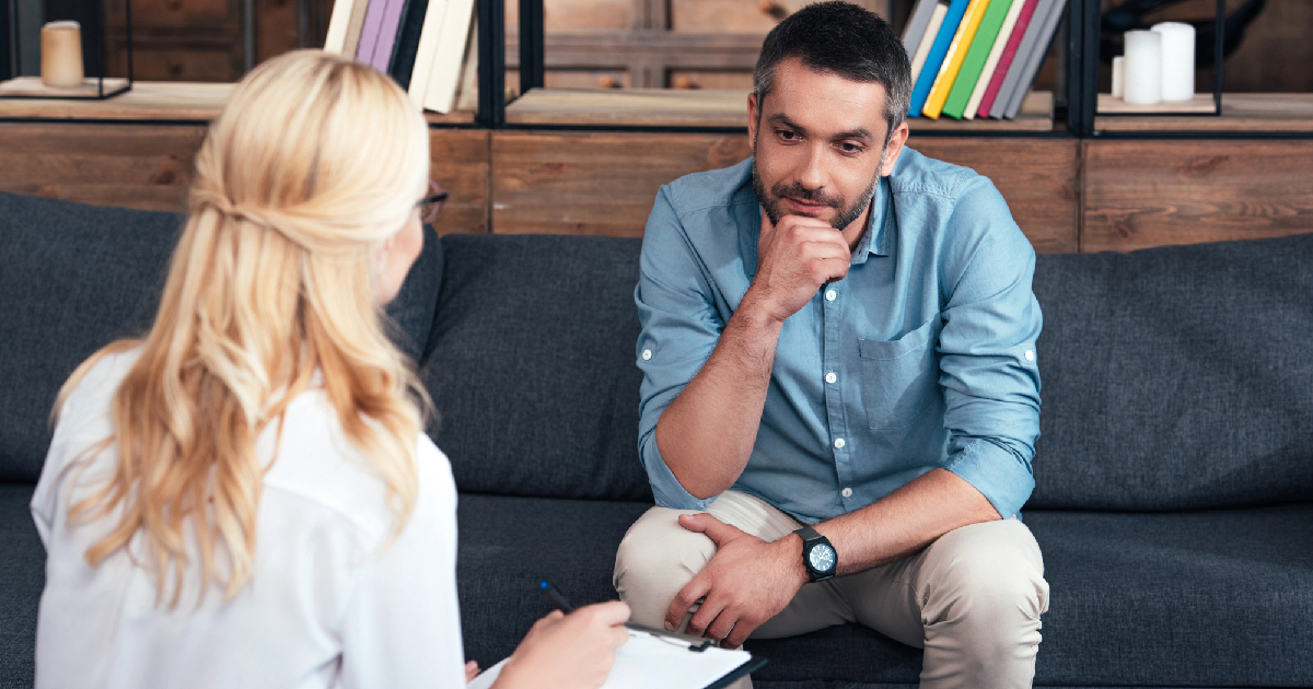 Man talking to therapist about his drug addiction