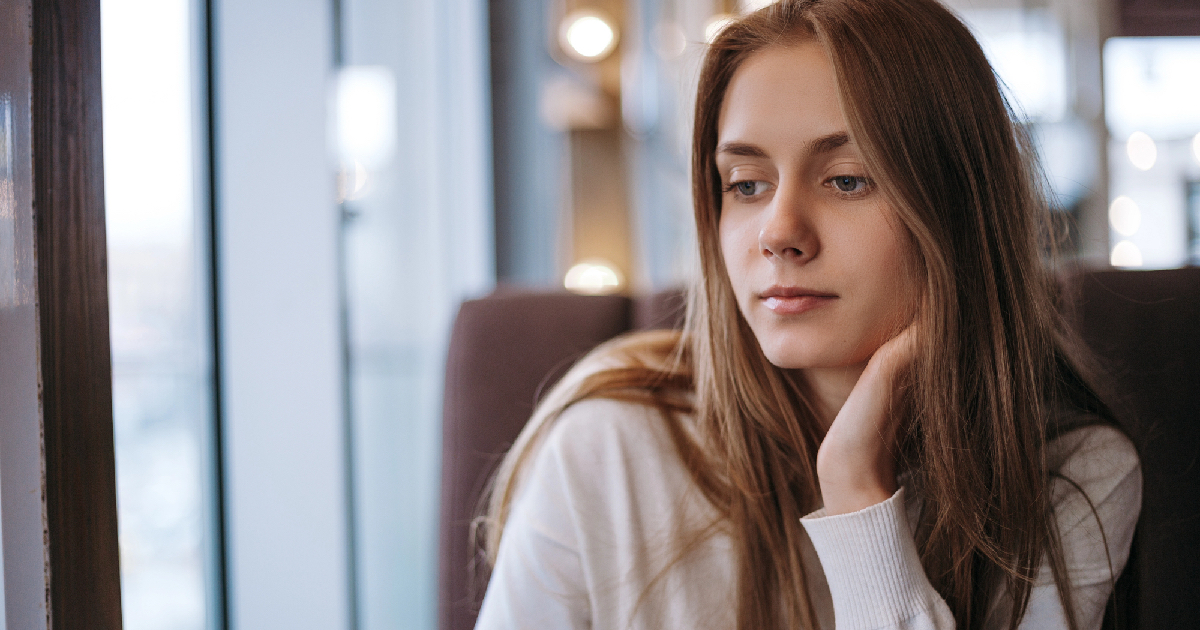Young woman looking sad and lonely