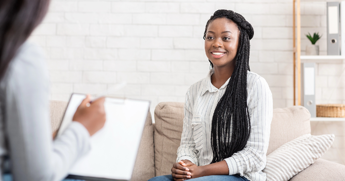 Happy African American girl in therapy session