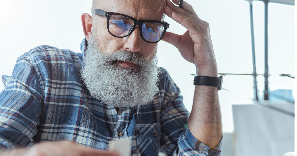 Older man looking stressed