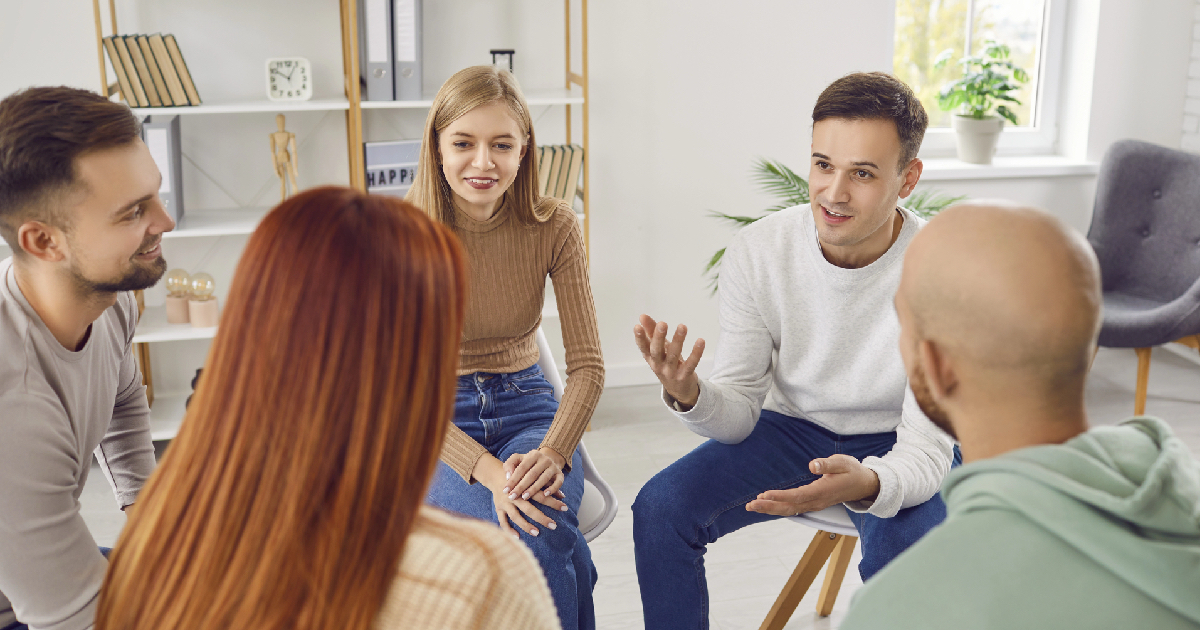 Group of people in therapy setting