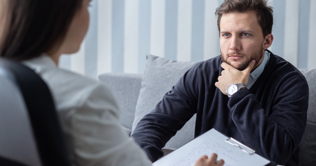 Confident man in therapy session